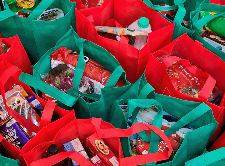 several shopping bags full of groceries