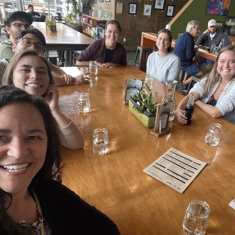 Group of people at a table.