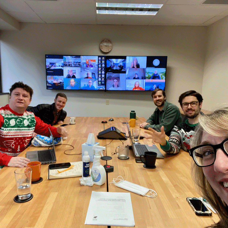 Team members in a conference room.