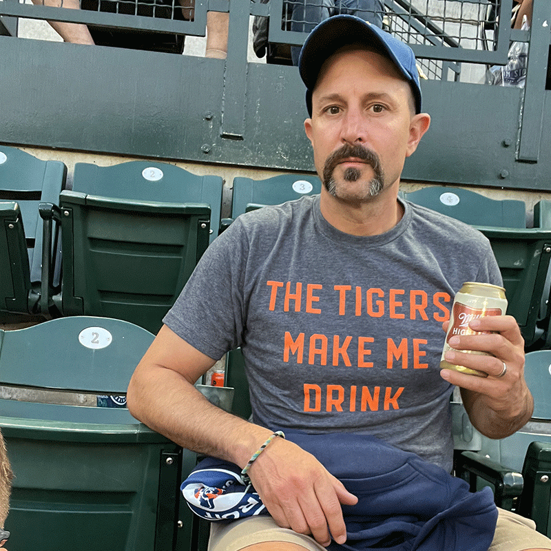 MFA employee watching a Mariners game.