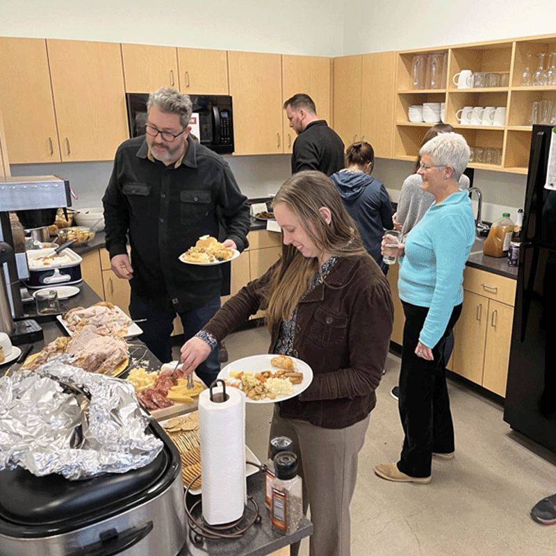 Group of people in a kitchen