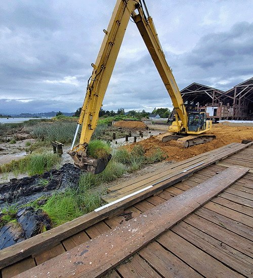 Excavator in a field