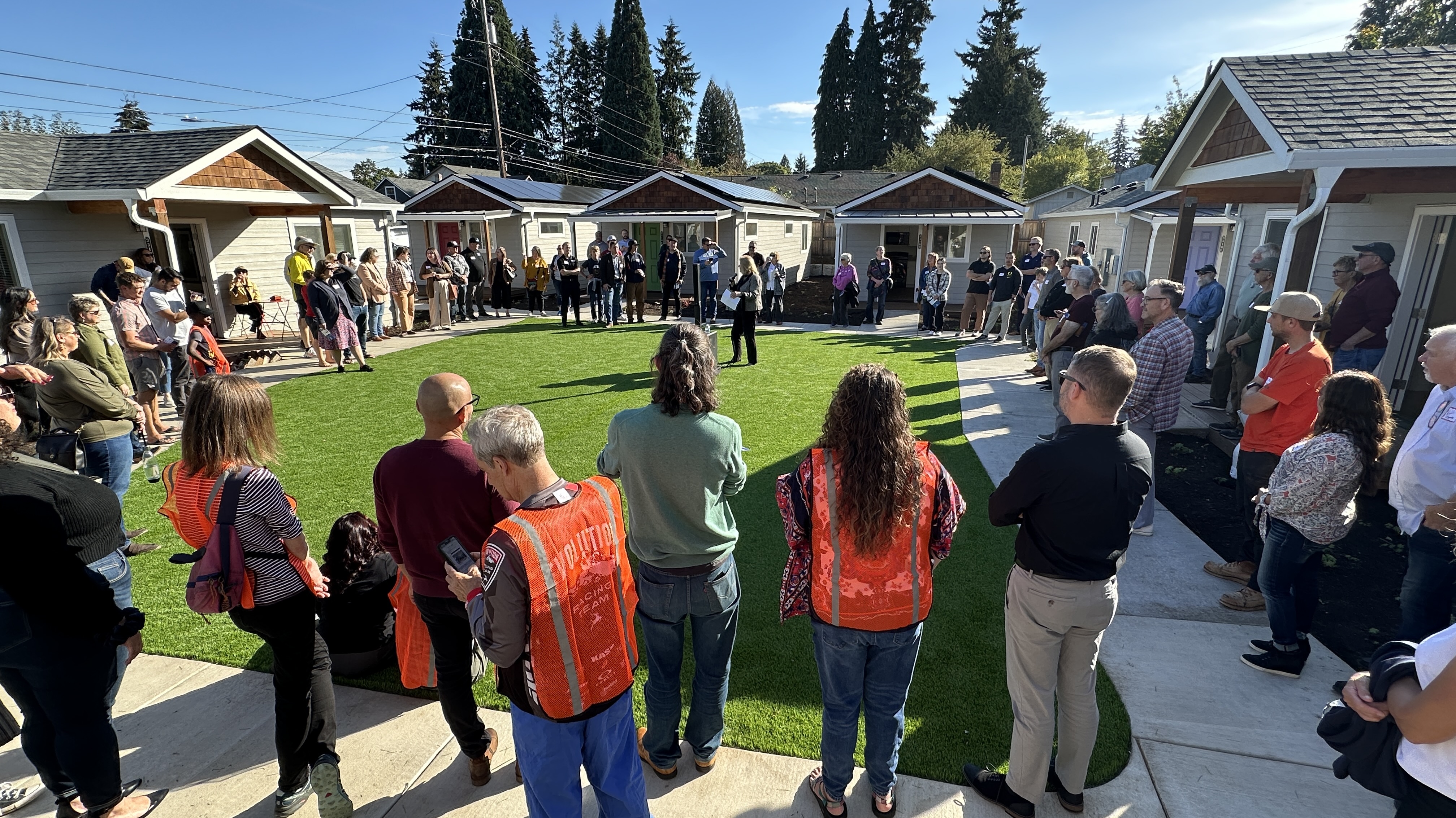 Ribbon-cutting for Community Roots Collaborative’s O Street property in Vancouver, WA on October 10, 2024. Phase I/II ESAs supported redevelopment into 20 affordable units, including seven two-bedroom tiny homes