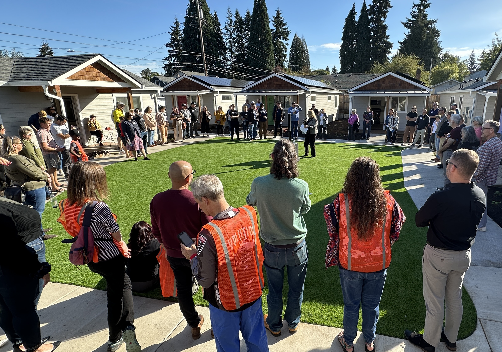 Ribbon-cutting for Community Roots Collaborative’s O Street property in Vancouver, WA on October 10, 2024. Phase I/II ESAs supported redevelopment into 20 affordable units, including seven two-bedroom tiny homes