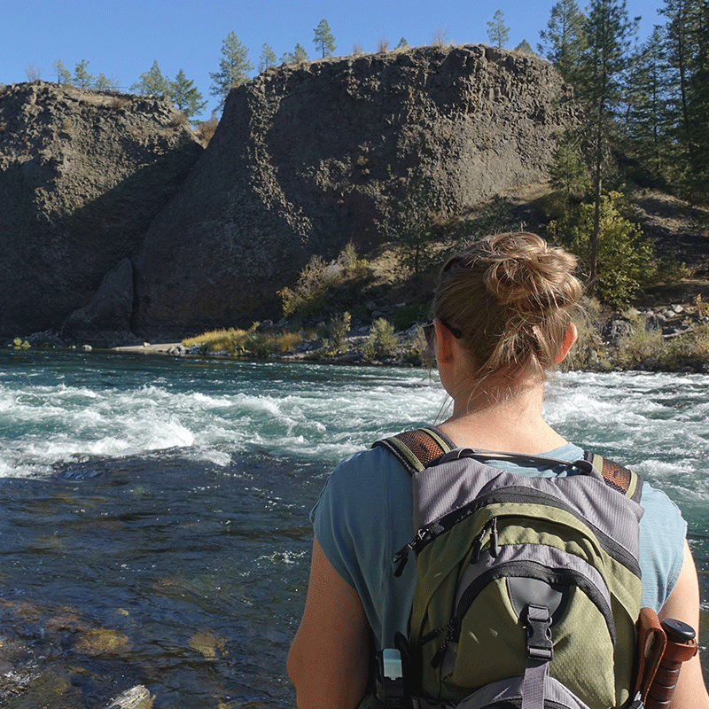 Woman by river