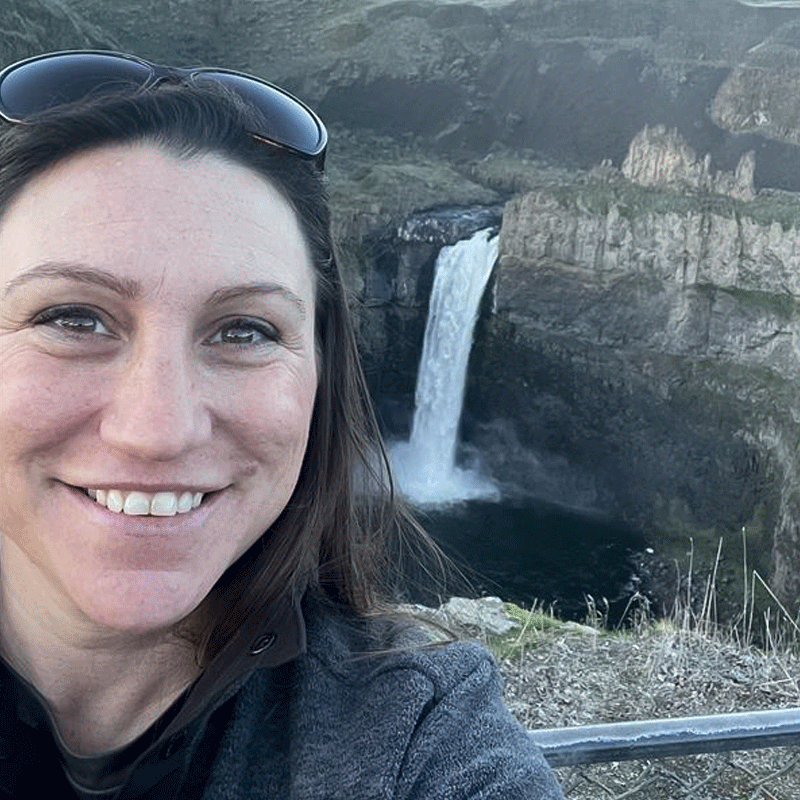 woman near waterfall