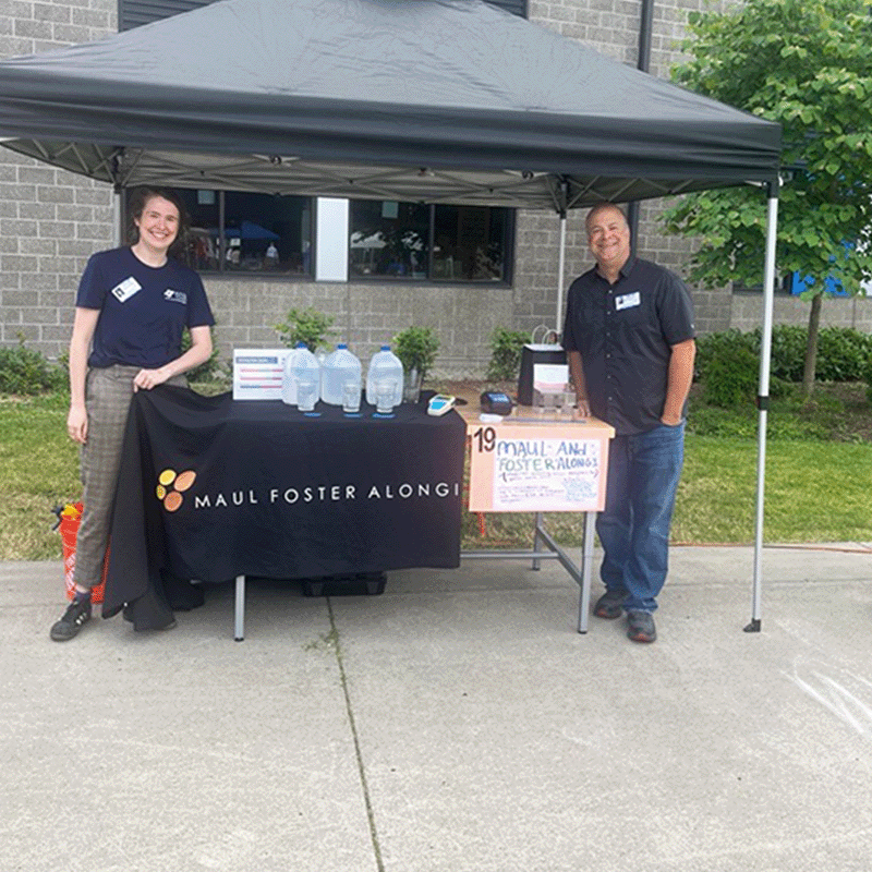 employees at booth and tent