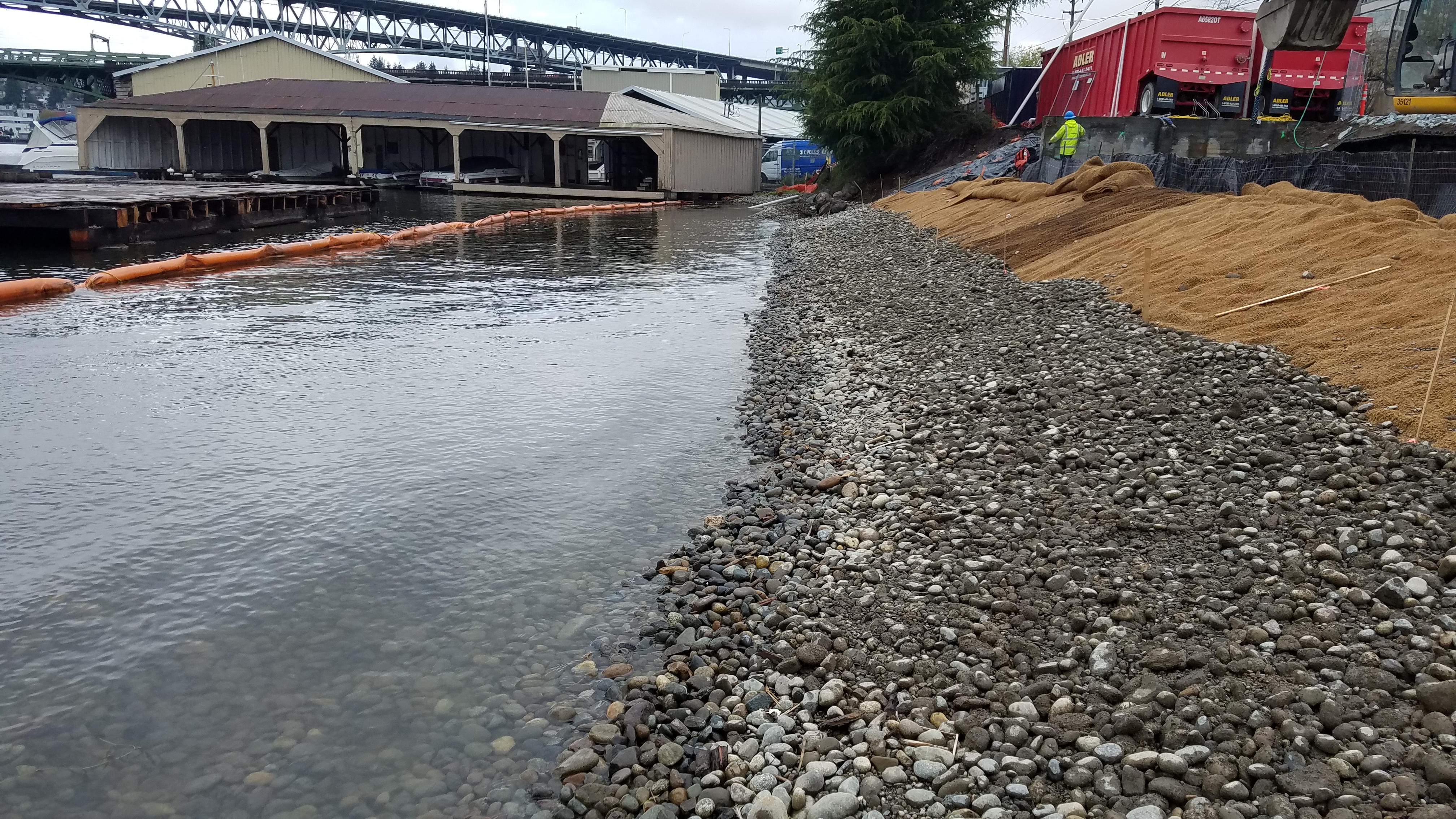 Fish mix beach aggregate placed along western shoreline of the park.