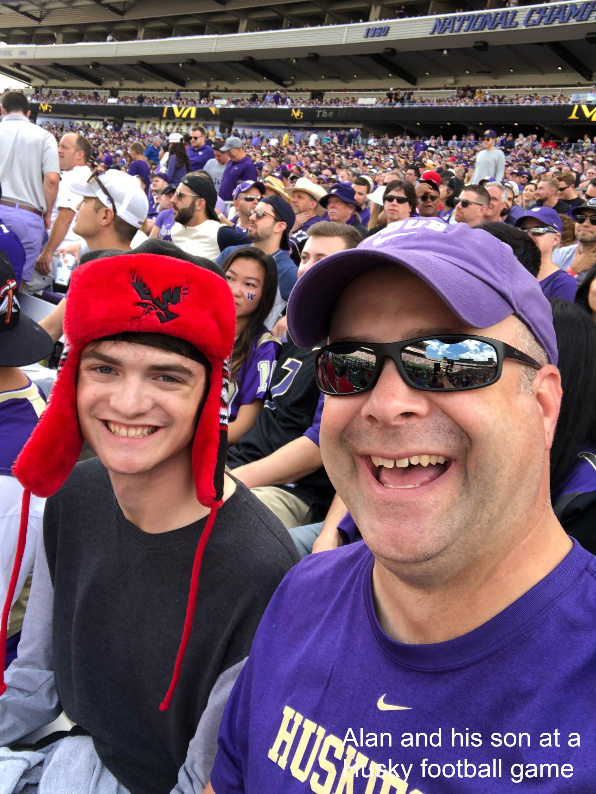 Alan and son at football game