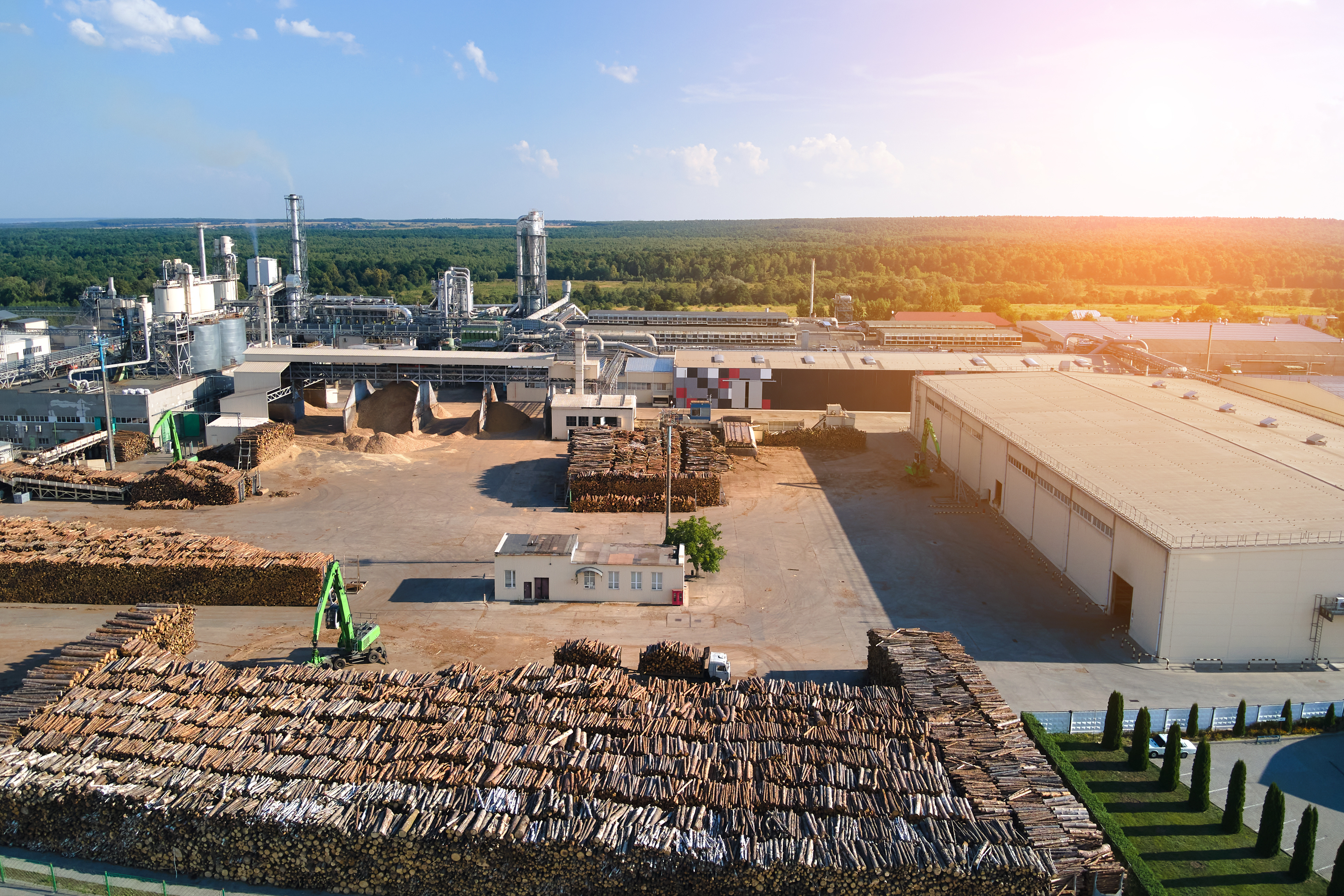 aerial of a wood products facility containing sawlogs and raw forest products