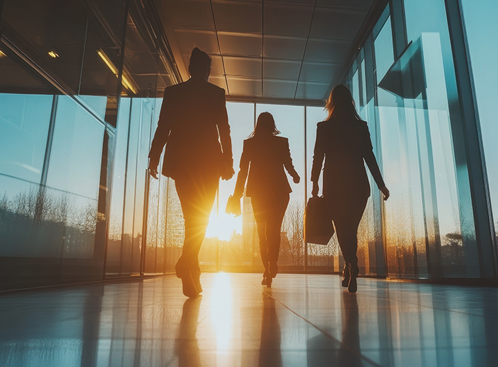 Three-Women-Walking-Hallway
