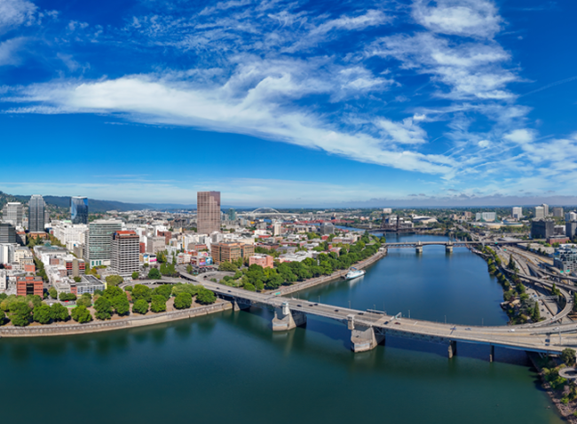 Businesses along the Portland waterfront with blue skies